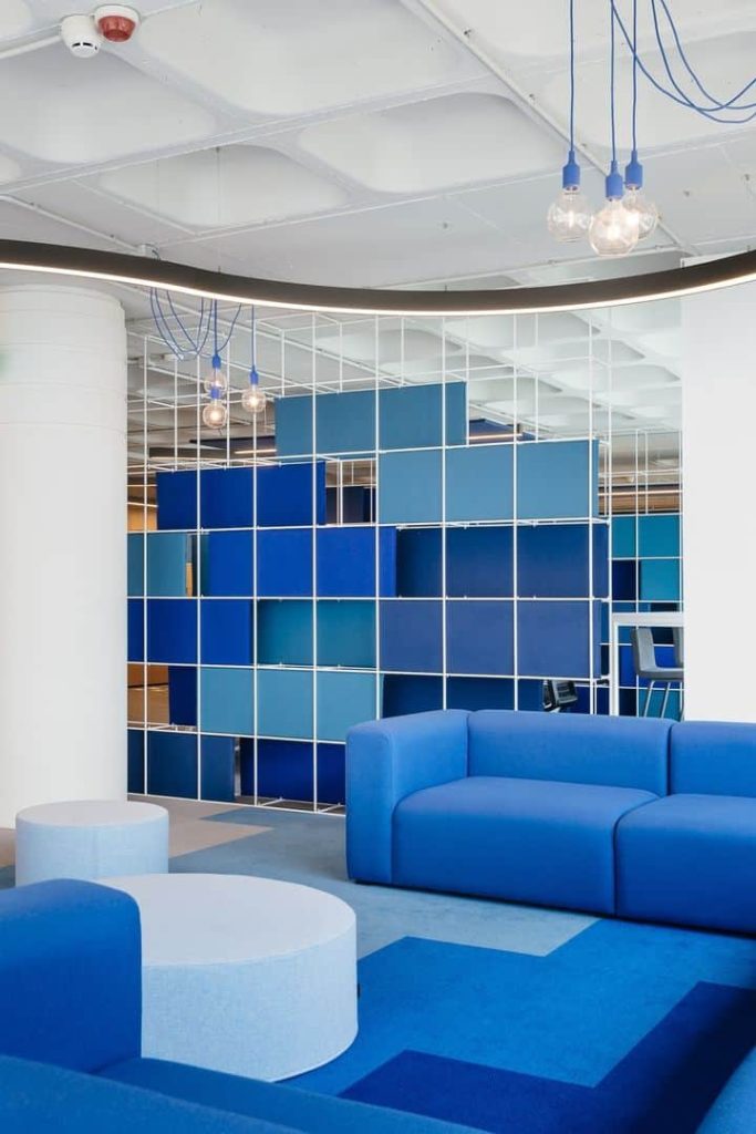 Artisan Touches and Company Colors for Office OLX Group Workspace NONAGON style
